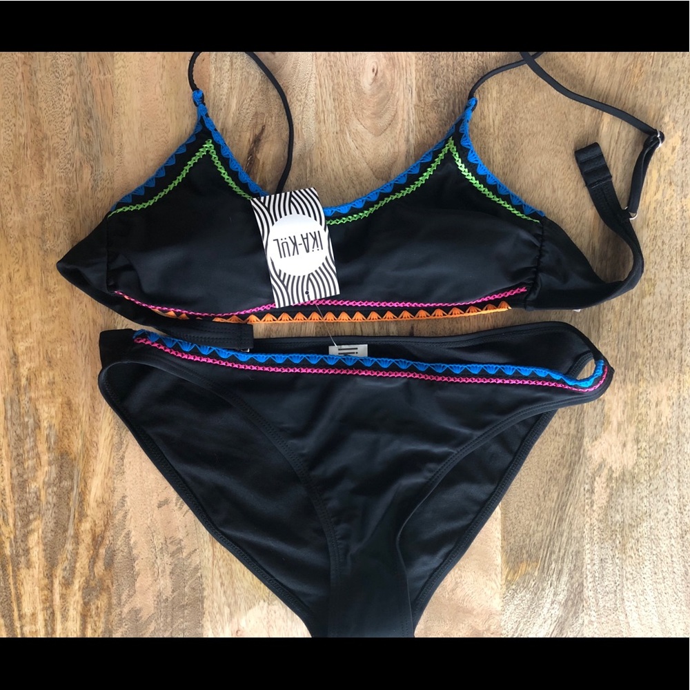 Black bikini with embroidered accents.